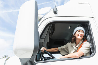 happy female truck driver